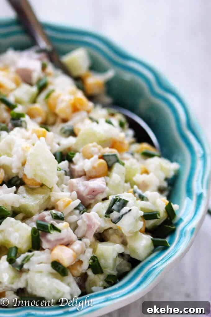 Rice Salad with Corn, Ham, Cucumber and Chives - super easy and refreshing salad that can easily replace your potato or pasta salad for the next BBQ gathering.
