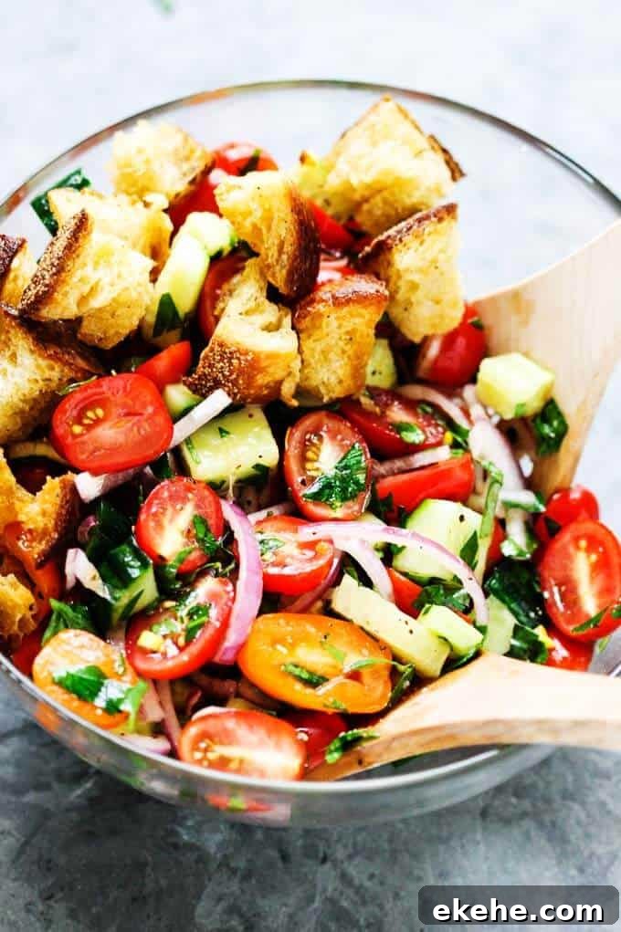 Summer Panzanella with Garlic Butter Bread - this popular Italian salad is a perfect addition to any summer meal or BBQ. Crusty bread that's been infused with garlic butter makes it irresistible.