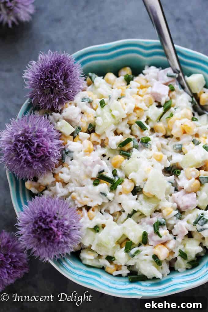 Rice Salad with Corn, Ham, Cucumber and Chives - super easy and refreshing salad that can easily replace your potato or pasta salad for the next BBQ gathering.
