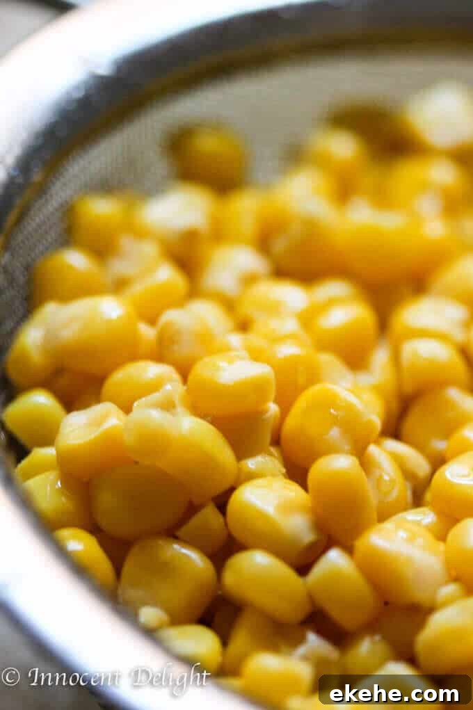 Rice Salad with Corn, Ham, Cucumber and Chives - super easy and refreshing salad that can easily replace your potato or pasta salad for the next BBQ gathering.