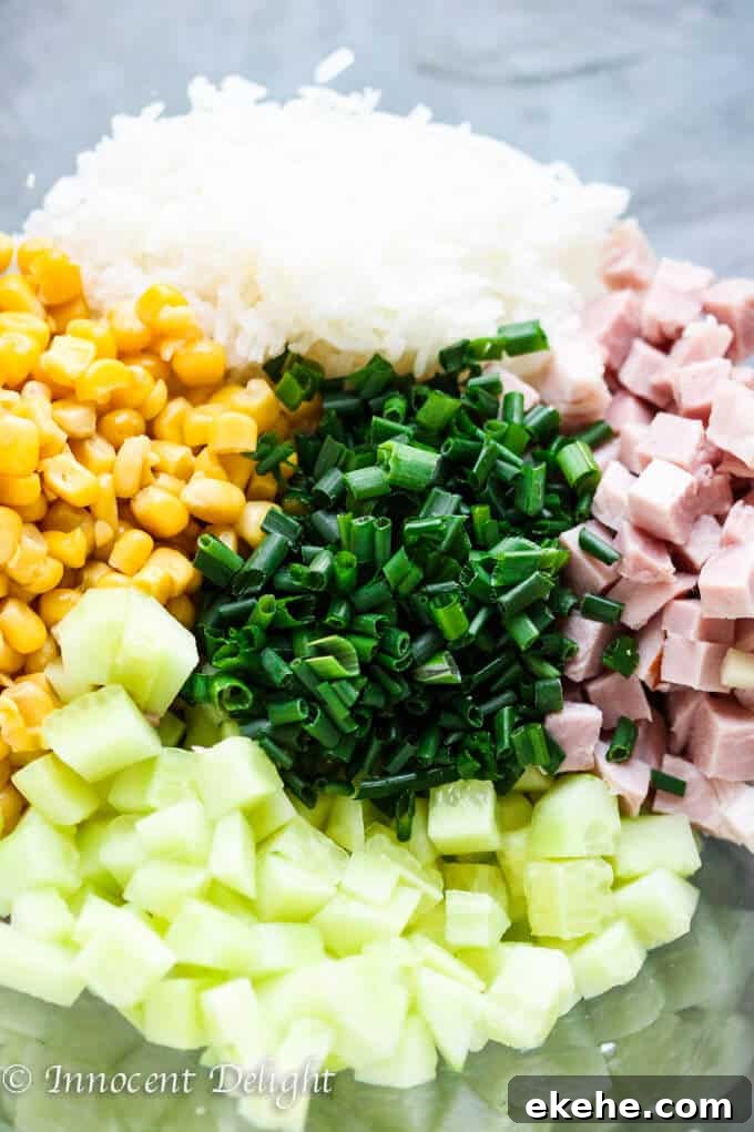 Rice Salad with Corn, Ham, Cucumber and Chives - super easy and refreshing salad that can easily replace your potato or pasta salad for the next BBQ gathering