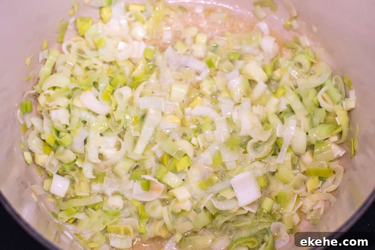 Leeks cooking in Dutch oven.