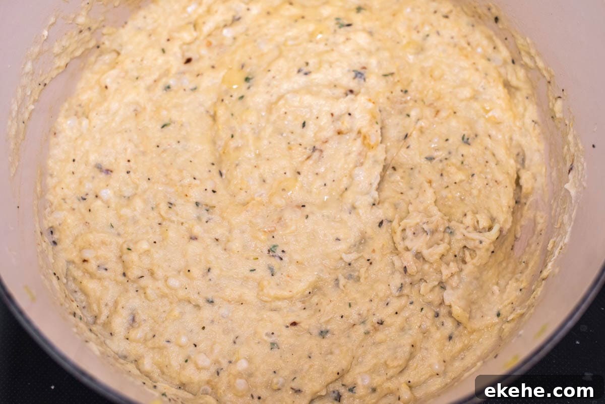 Corn puree sauce in Dutch oven.