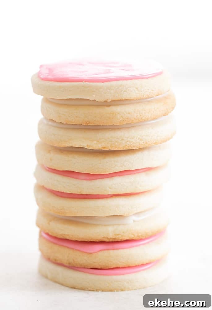Tall stack of meltaway cutout cookies with icing