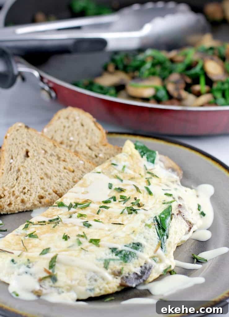 Healthy and satisfying, this egg white omelet with vegetarian sausage, spinach, and mushroom, will satisfy you breakfast, lunch or dinner. If you have goals this year and want to eat better to get there, this recipe is for you.