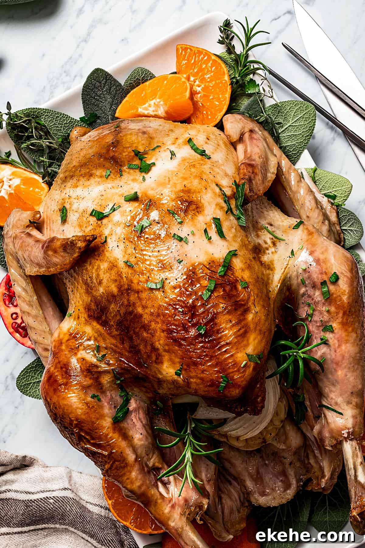 Easy roasted turkey made with garlic, fresh herbs, and butter.