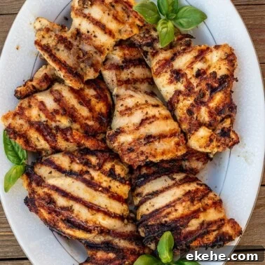 grilled boneless chicken thighs on a platter