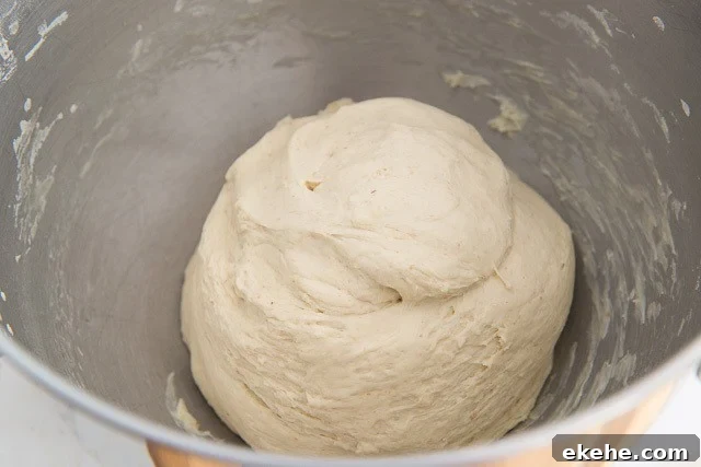 Buffalo Garlic Knot Recipe: Spicy, Cheesy Pull-Apart Rolls 6 Ball of Pizza Knot Dough in Stand Mixer Bowl