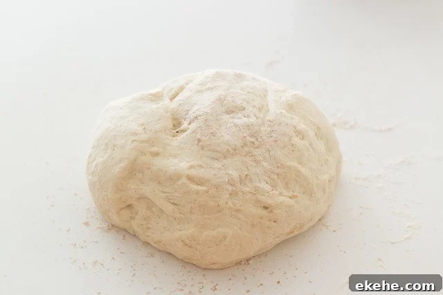 Buffalo Garlic Knot Recipe: Spicy, Cheesy Pull-Apart Rolls 8 Big Ball of Pizza Dough on Countertop