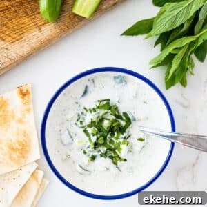 Bowl of cucumber, yogurt and mint salad.