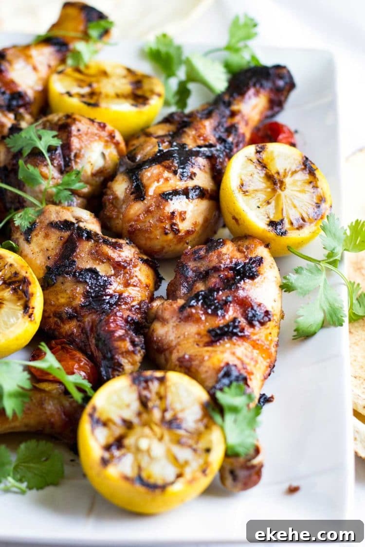This Honey Glazed Harissa Grilled Chicken has just the right kiss of heat and the honey sweetens this up for a twist on the regular BBQ chicken. The family loves it! www.keviniscooking.com