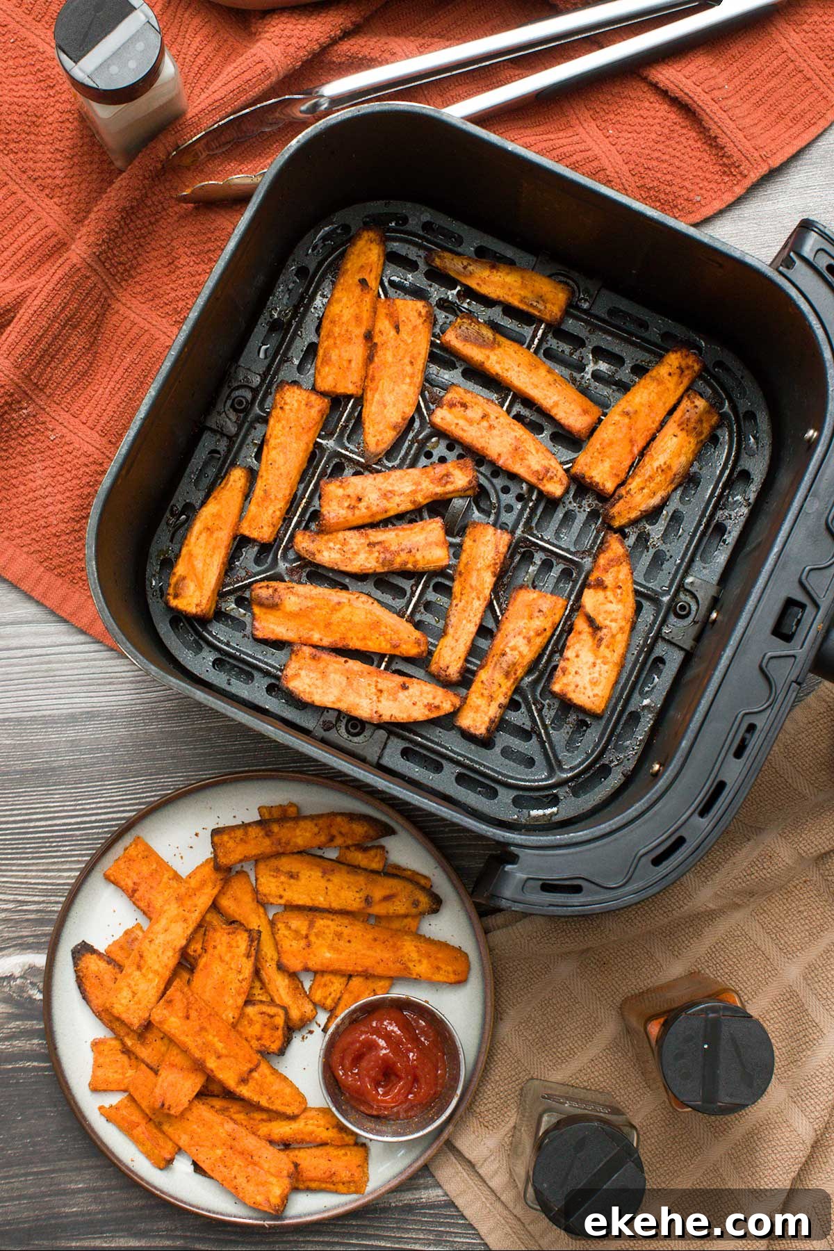 Sweet potato wedges in an air fryer.