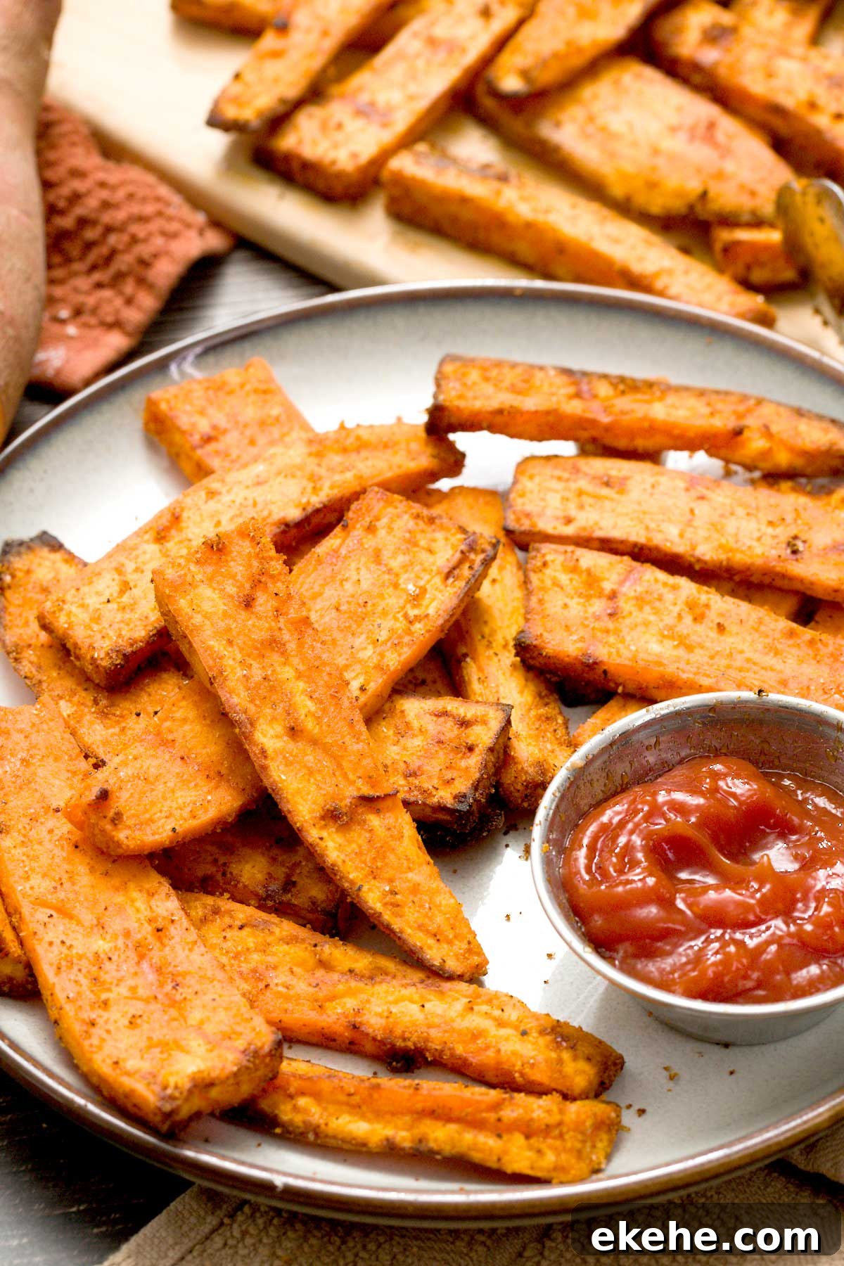 A close-up of a plate of air fryer sweet potatoes.