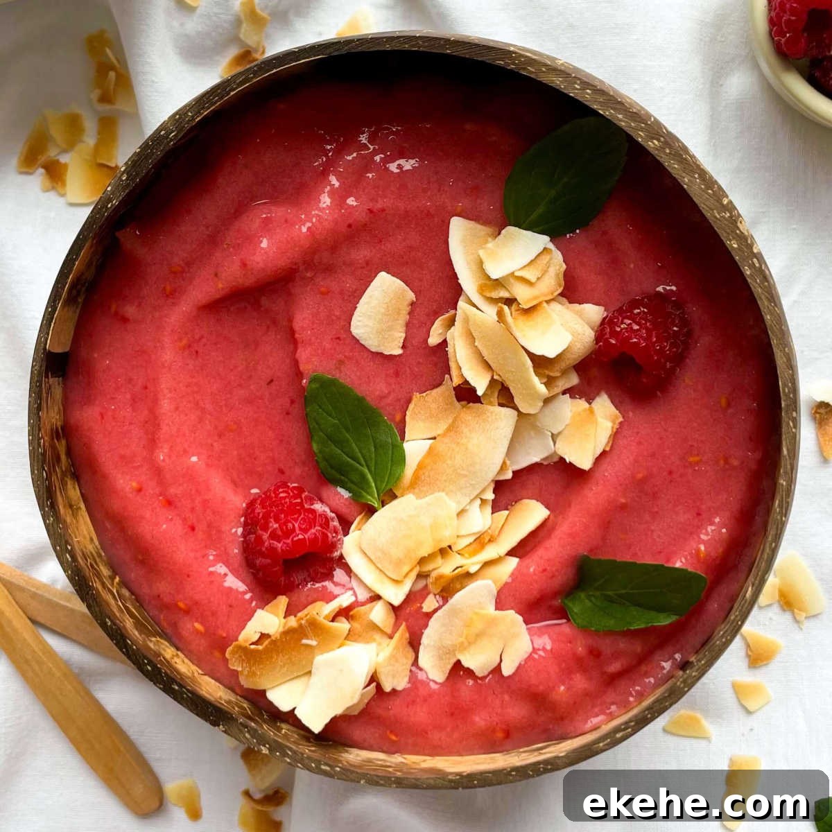 raspberry pineapple smoothie bowl with coconut