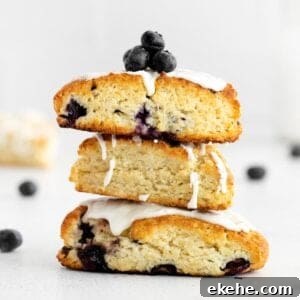 blueberry scones stacked on top of each other on a countertop
