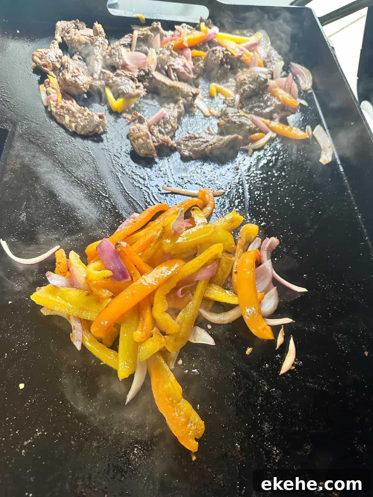 Fajita veggies being cooked