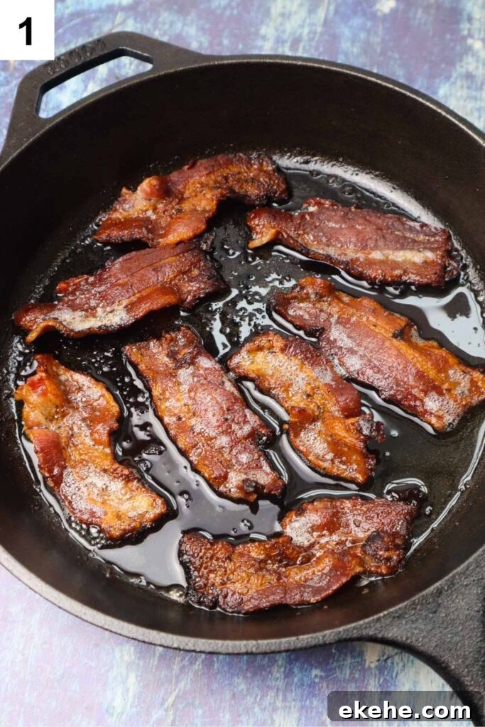 cast iron skillet with cooked crispy bacon