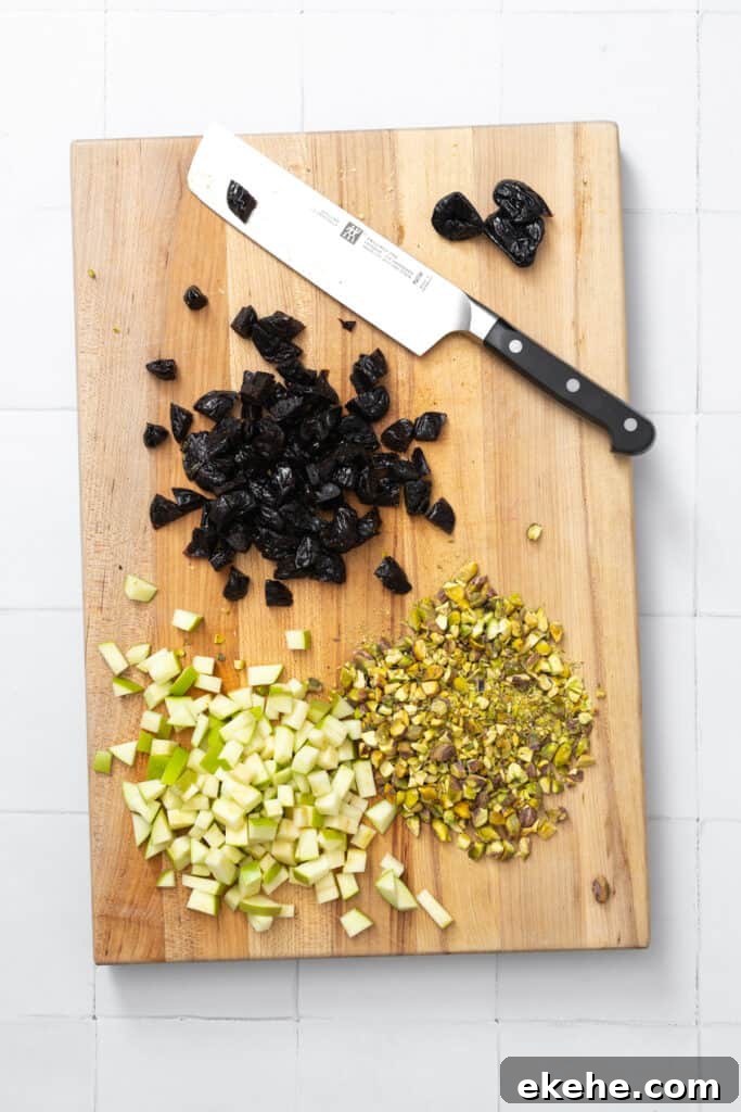 chopped apples, prunes and pistachios