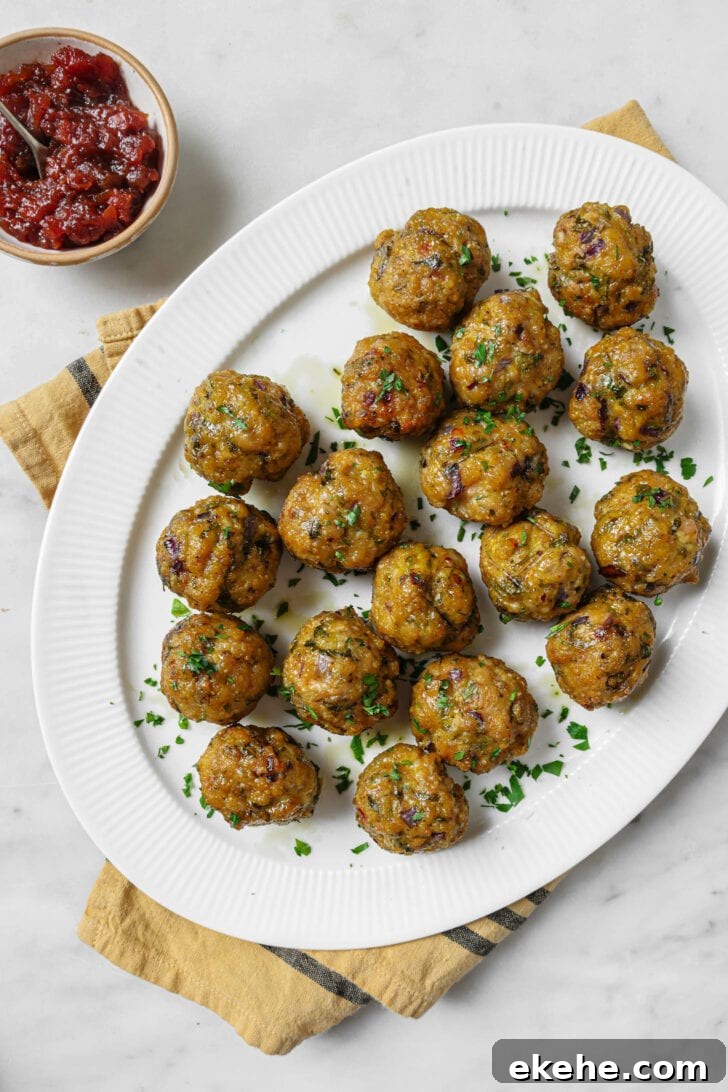 Top view of a platter of Baked Chicken Kofta garnished with chopped cilantro.