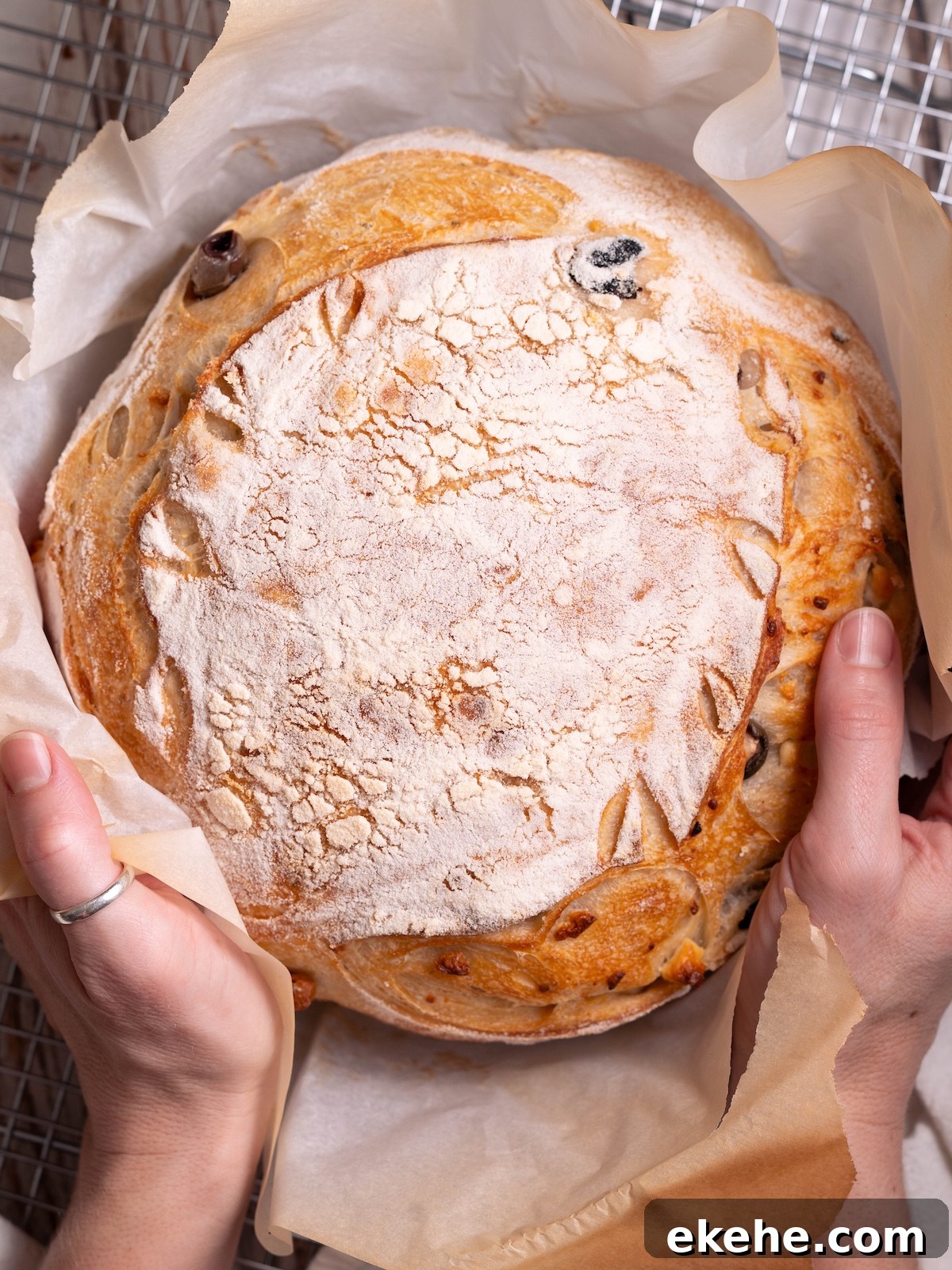 A freshly baked loaf of olive and feta sourdough bread