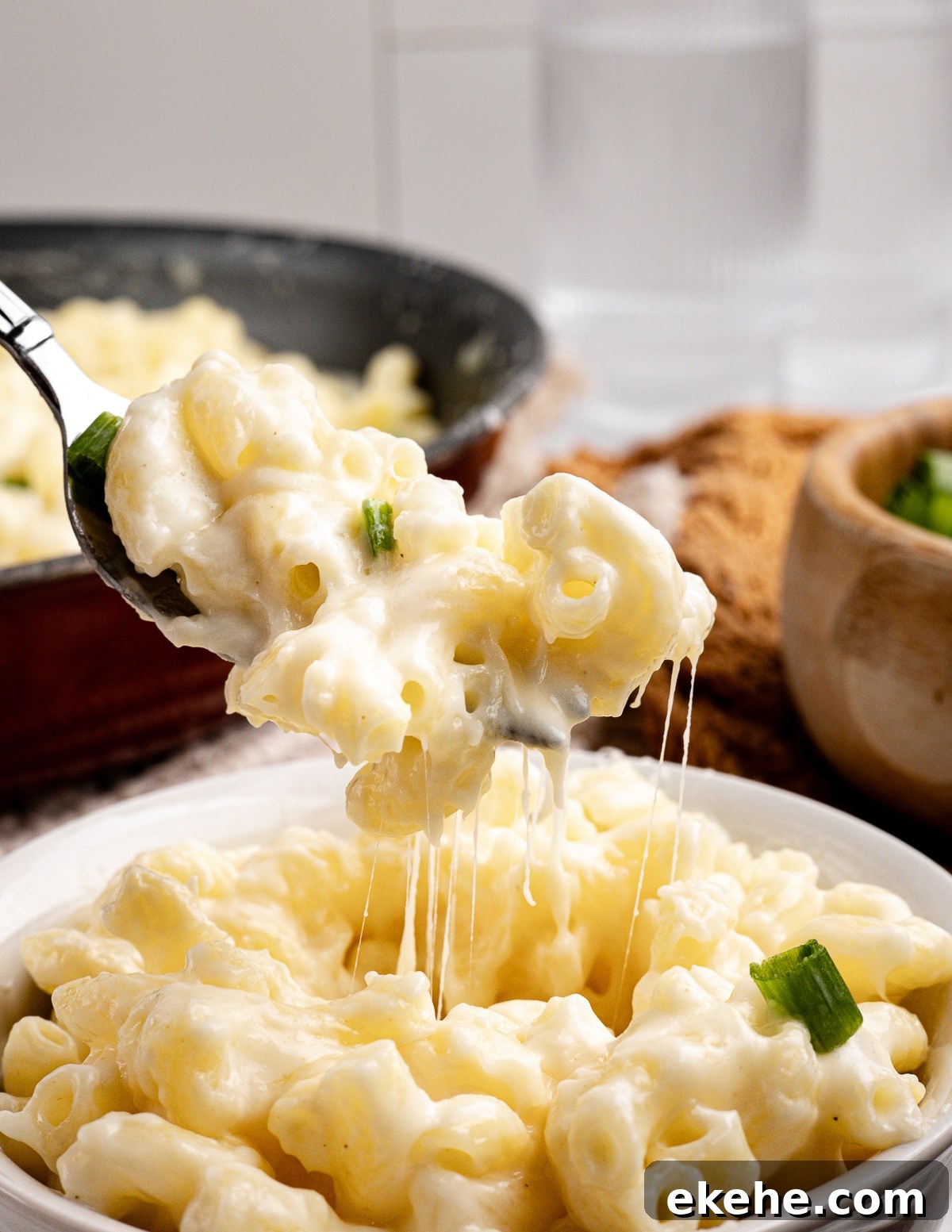 a forkful of gluten free mac and cheese. 