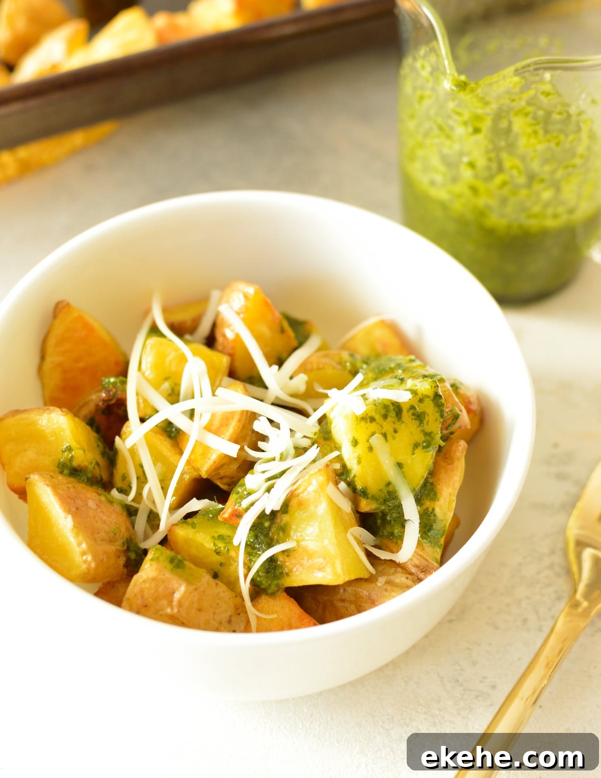 a bowl of roasted potatoes with cilantro vinaigrette