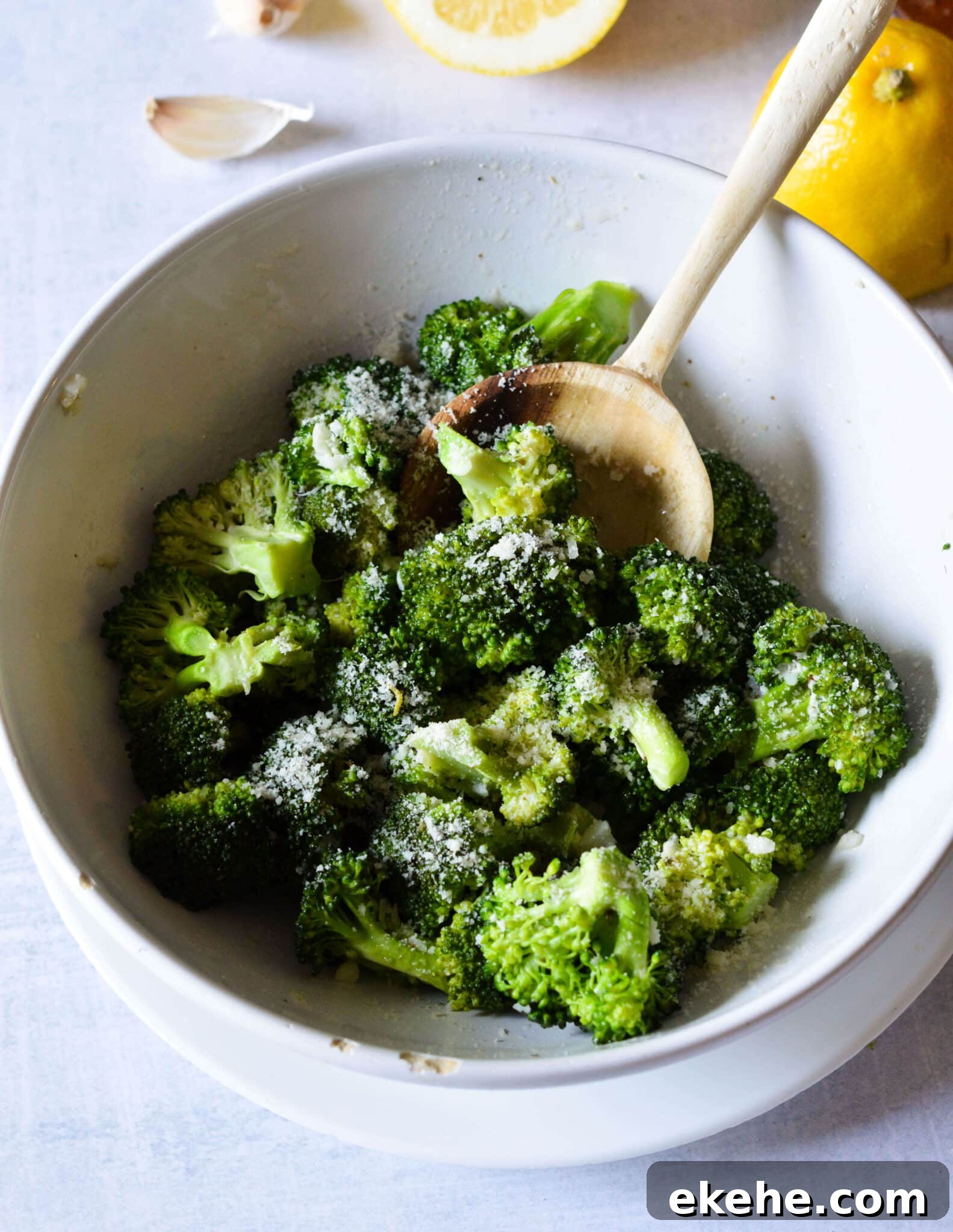 a bowl of garlic butter broccoli. 