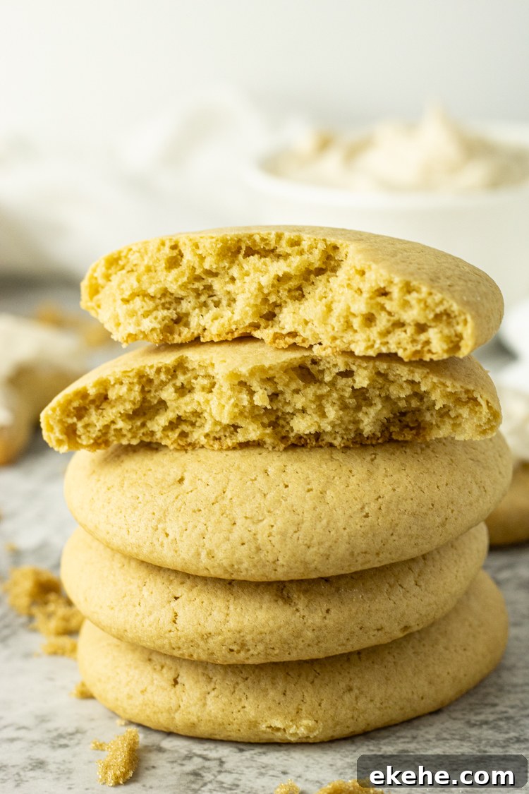 stacked brown sugar cookies with the top cookie split in halves