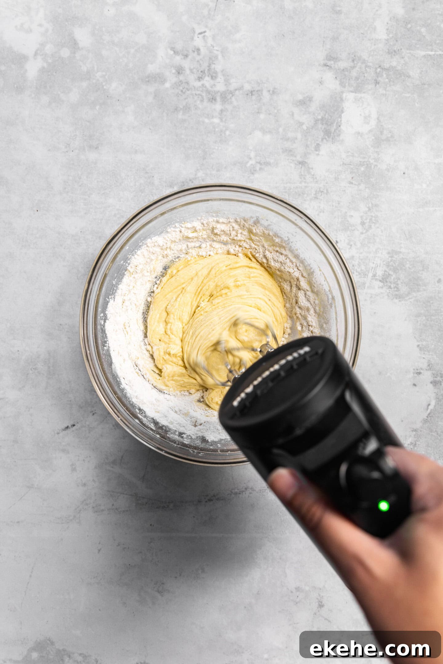 Dry ingredients being incorporated into cupcake batter