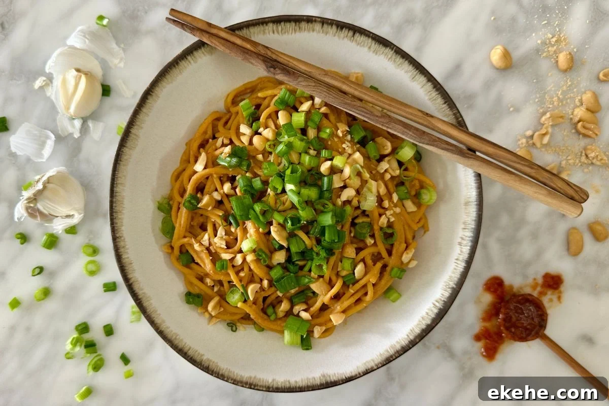 Healthy Spicy Peanut Noodles with PB2 in a bowl.