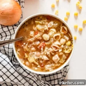 An overhead image of a bowl of minestrone soup.
