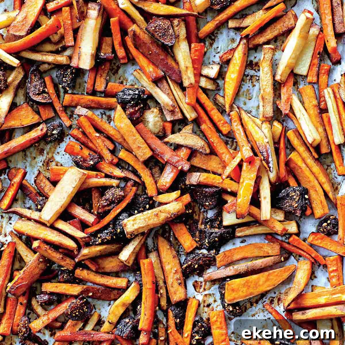 Roasted tzimmes on a large sheet pan.