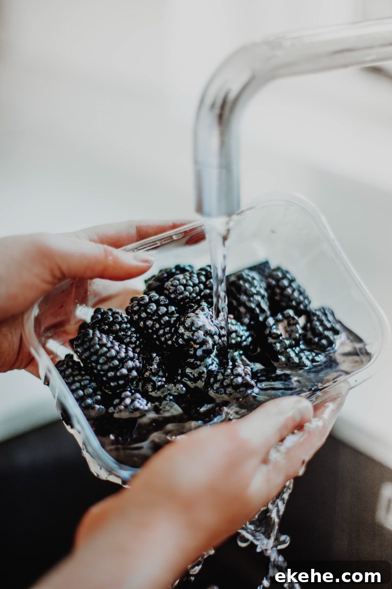 washing the blackberries