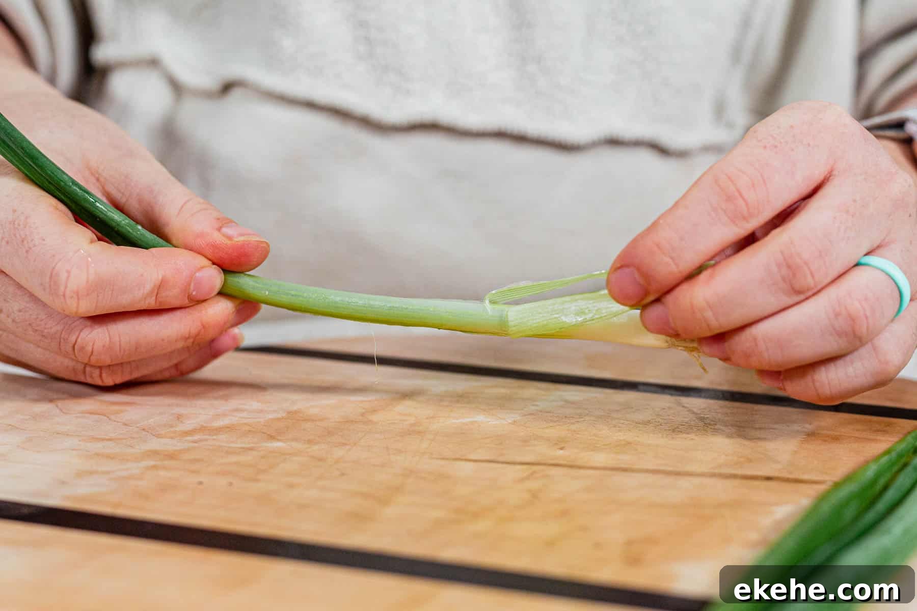 removing the bad layer from green onions