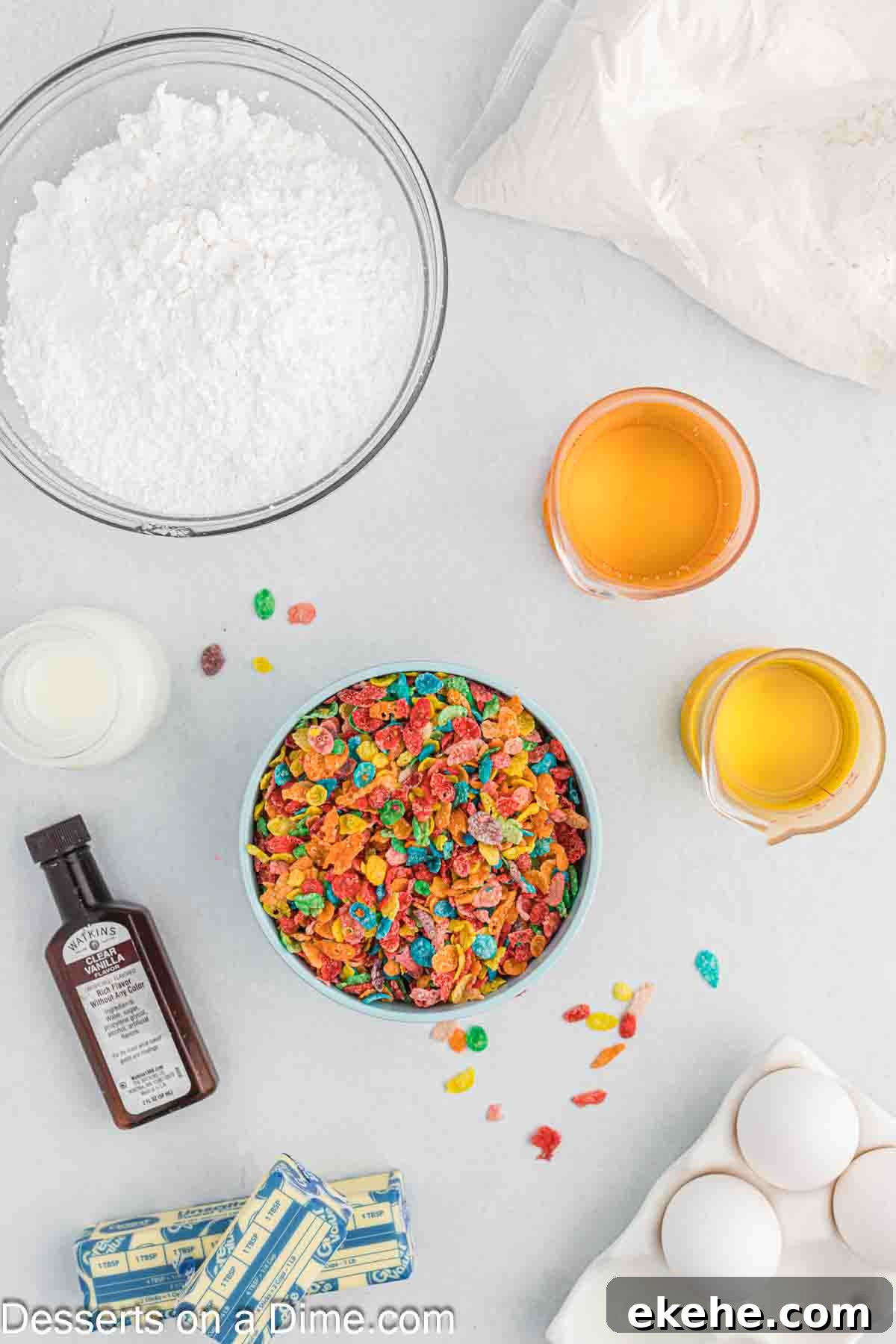 Ingredients for Fruity pebbles cupcakes- cake mix, eggs, cereal, butter, powdered sugar, cereal. 