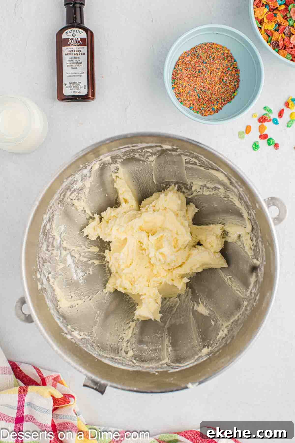 Butter and powdered sugar in bowl. 