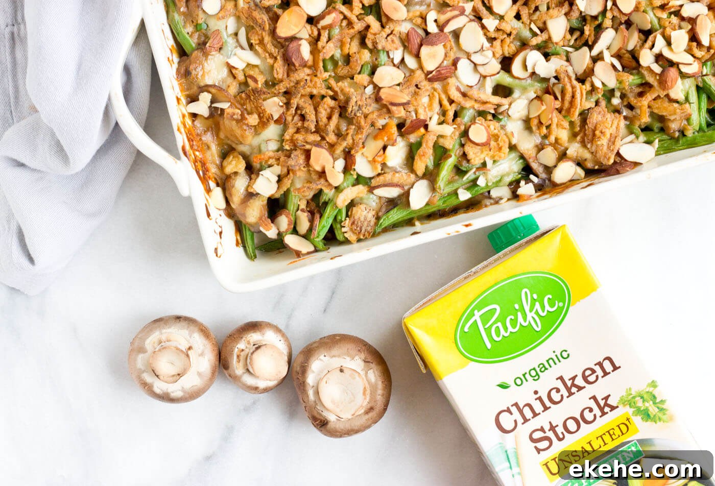 Because we all need Green Bean Casserole in our lives. This recipe is easy and made with homemade cream of mushroom soup + au gratin topping! Extra crunchies, please!