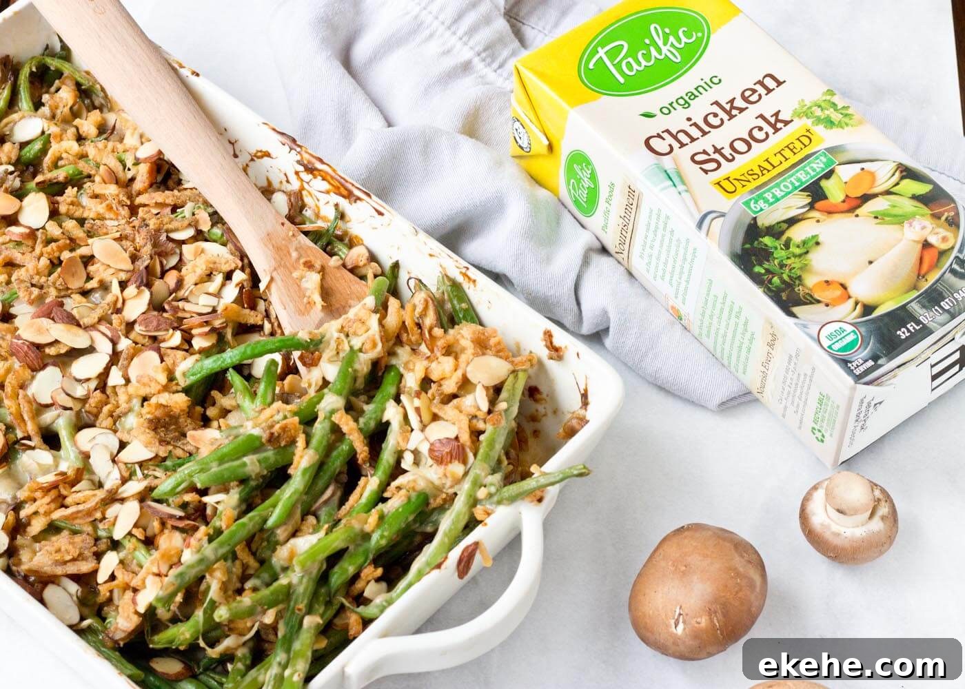 Because we all need Green Bean Casserole in our lives. This recipe is easy and made with homemade cream of mushroom soup + au gratin topping! Extra crunchies, please!