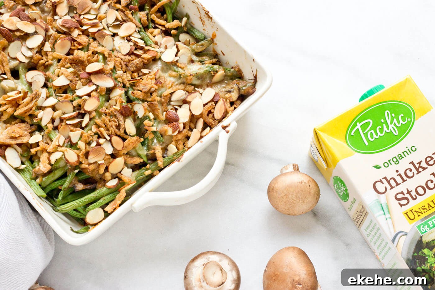 Because we all need Green Bean Casserole in our lives. This recipe is easy and made with homemade cream of mushroom soup + au gratin topping! Extra crunchies, please!