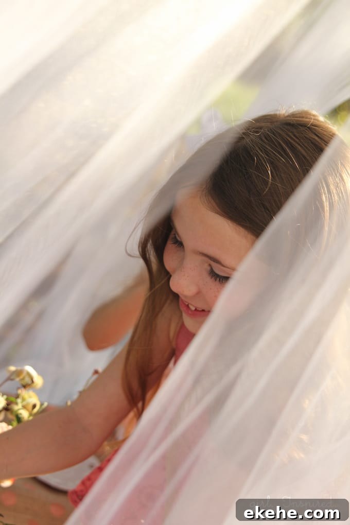 Hanging Tulle Tent - great for entertaining little guests or creating a fun focal spot in the yard