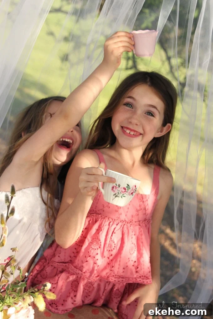 Hanging Tulle Tent - great for entertaining little guests or creating a fun focal spot in the yard