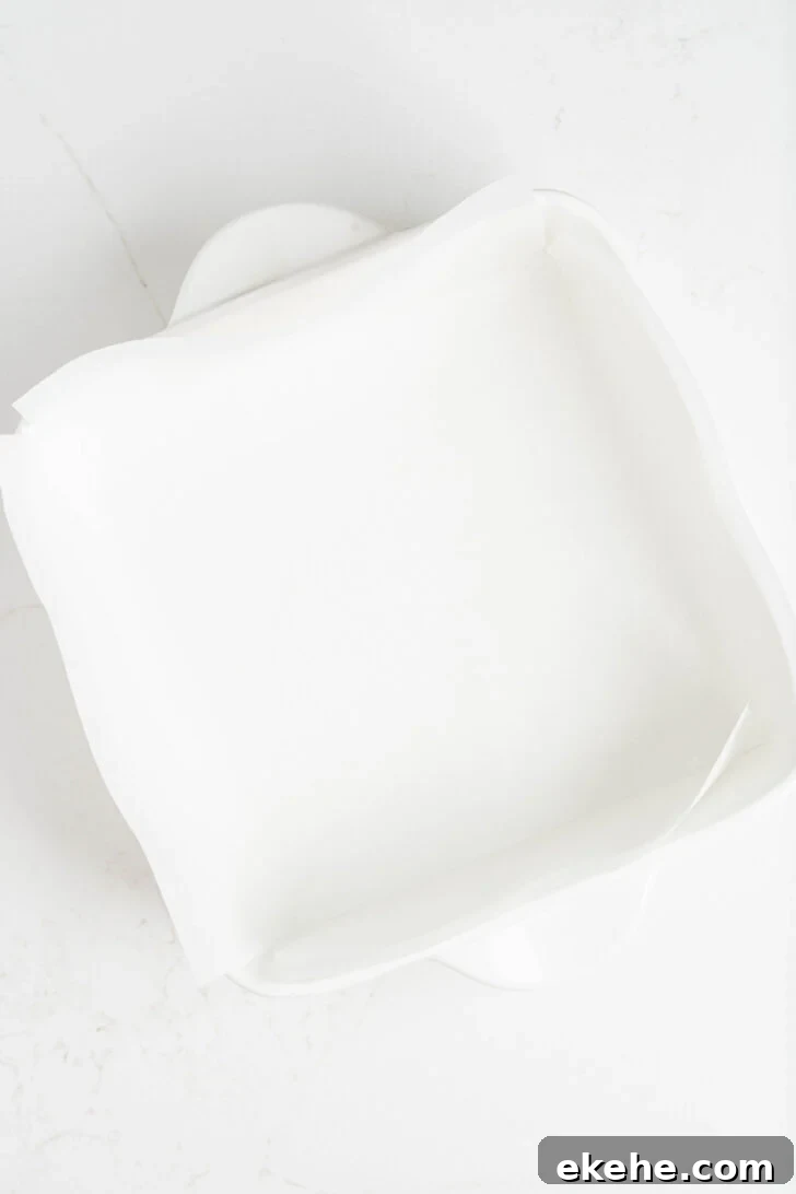 A baking dish with parchment paper.