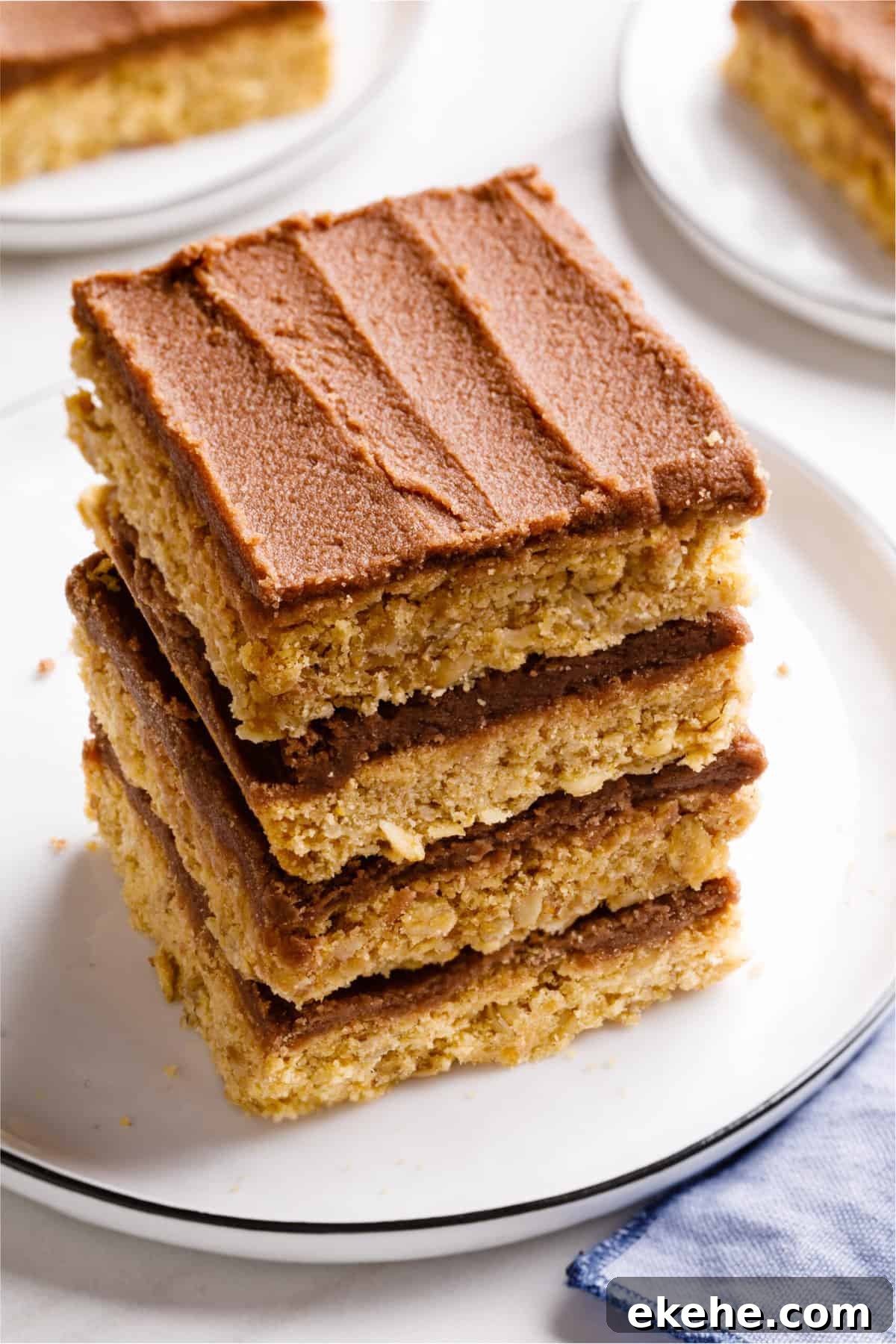 stack of four lunch lady bars servings on a white round plate