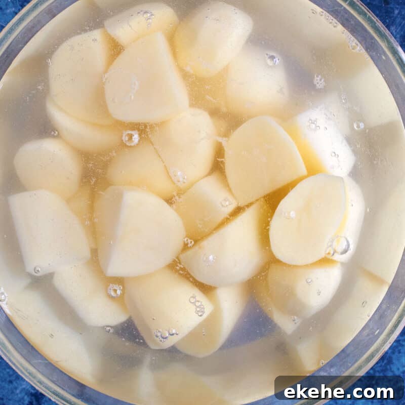 Potatoes soaking in water.