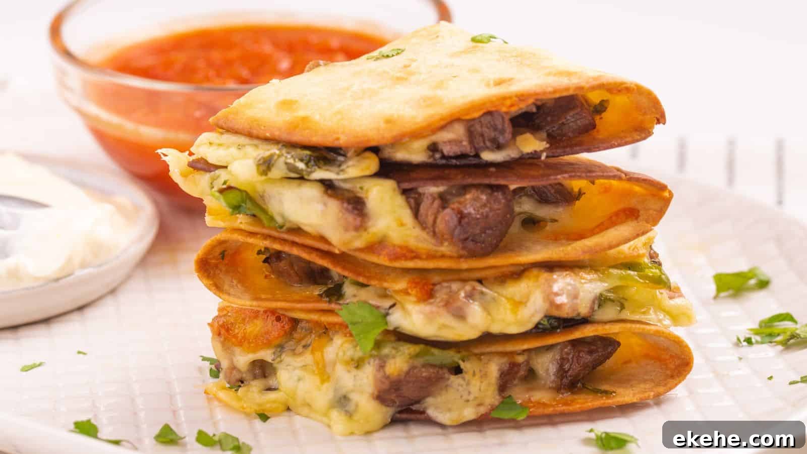 A stack of quesadillas filled with cheese and steak served with a side of red salsa on a white plate.