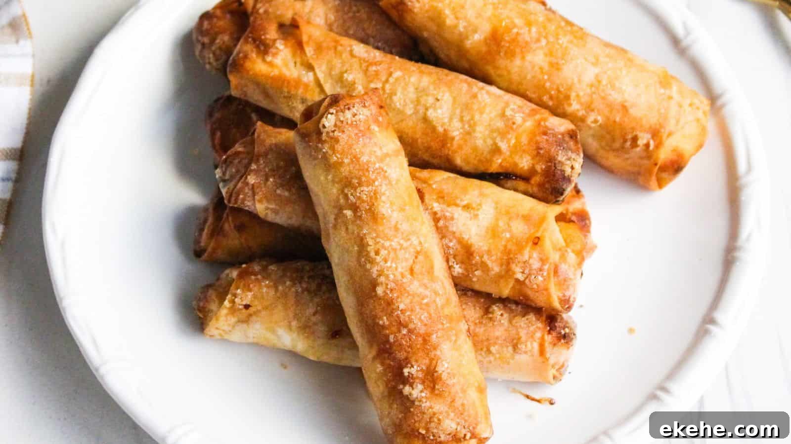 A plate of freshly cooked Filipino banana turon lumpia spring rolls.