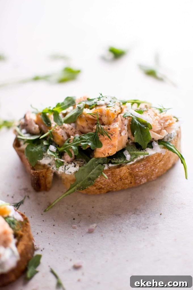 close-up of baked salmon tartine