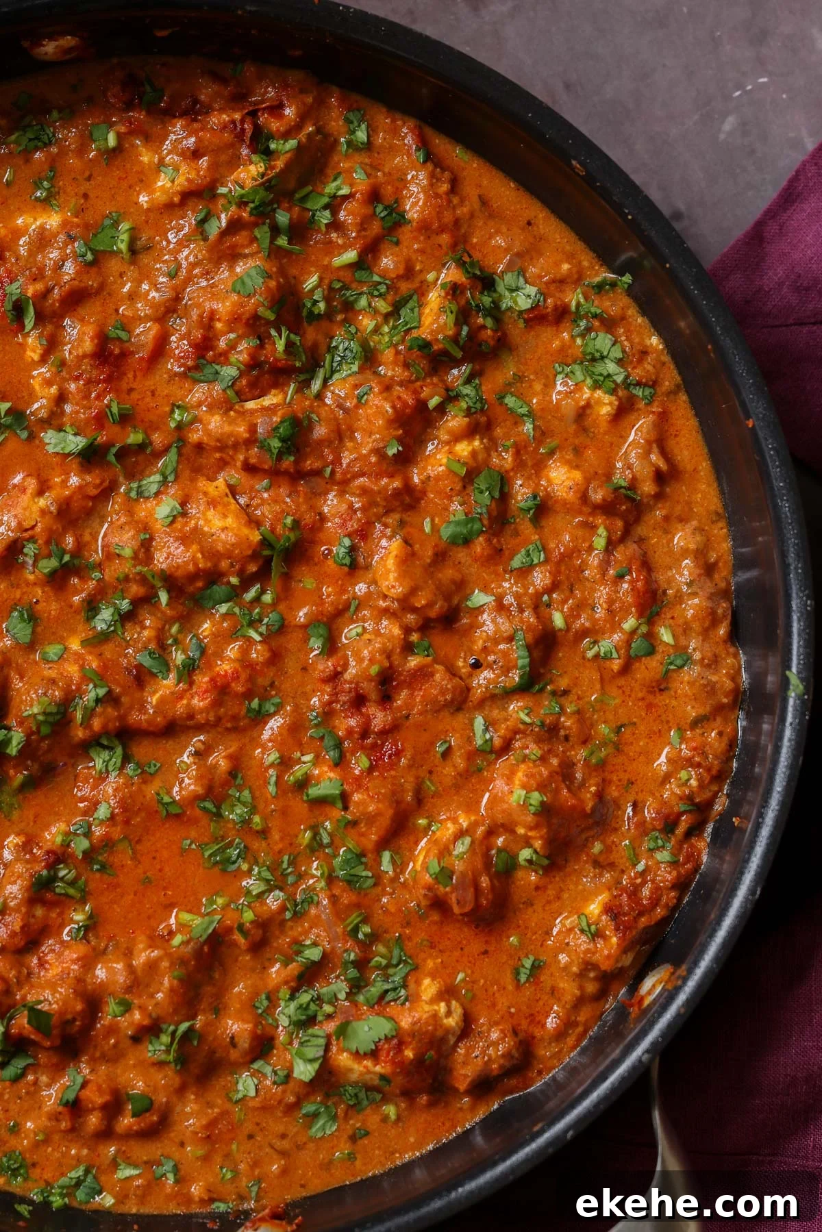 chicken angara in the pan after cooking and adding garnish
