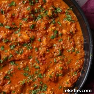chicken angara in the pan after cooking and adding garnish