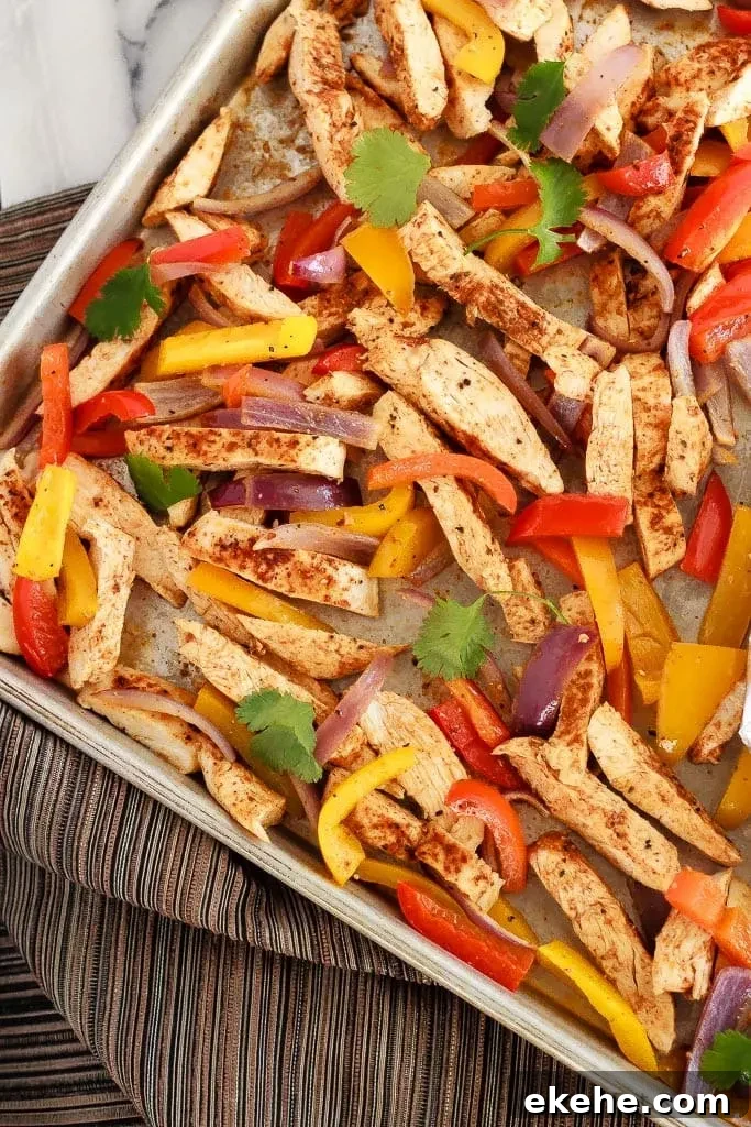 Quick and easy chicken fajitas with just one sheet pan to clean afterwards! This is my new favourite way to make one of my family's favourite meals!